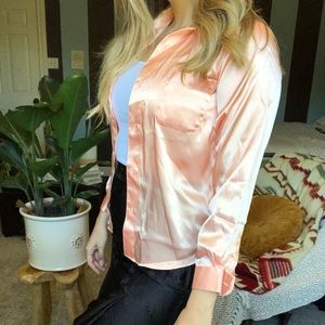 Light orange silky button down shirt